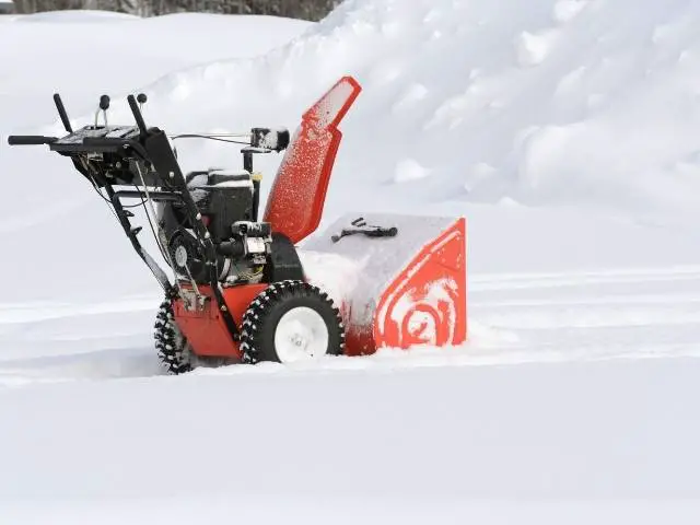 Snow blower requires constant priming to run.