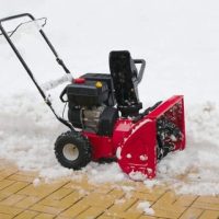 Causes of a snow blower surging and backfiring.
