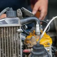 Steps for fix a two-stroke engine that won't start when hot.